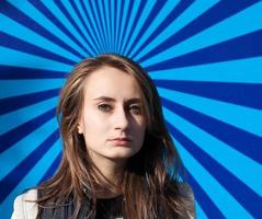 Young woman on a striped background photo