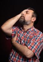 Portrait of sick middle aged man. photo