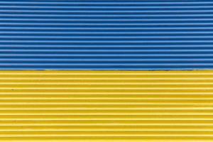 Fence painted like Ukrainian flag photo