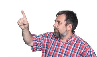 middle-aged man pointing with finger photo