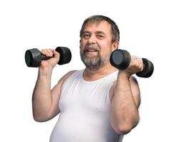 man exercising with dumbbells photo