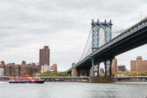 Manhattan Bridge and CitySightseeing Skyline Cruise boat photo
