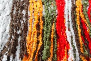 textura de flecos de lana e hilos de colores foto