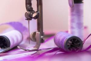 old sewing machine and sewing elements photo