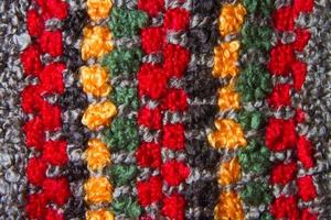 texture of multi-colored loom woven fabrics photo