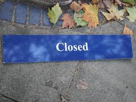 closed sign on the floor photo