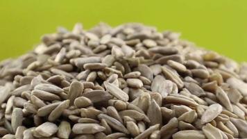 Rotation of peeled raw sunflower seeds. Studio shot. Healthy food, super seeds concept. Food background. Gastronomy concept, natural products. video