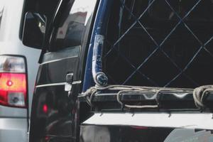 Close up photo of a back lamp of car that stuck in a traffic jam