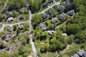 upper middle class american neighborhood with curving street in Maryland photo