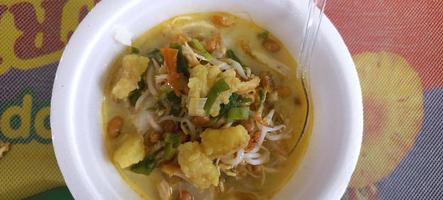 Chicken Soto is a traditional soupy food from Indonesia photo