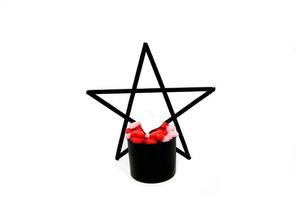 Black star modern bucket contains pink hearts, red and white hearts for adding text and copy space with star isolated on white background. Valentine's day and Romantic object concept photo