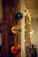 Close up Christmas ornaments hanging on wall concept photo