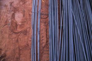 Steel wire on construction site, closeup of iron wire in construction site photo