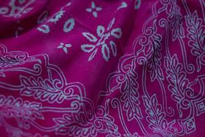 shabby batik-patterned tablecloth wrinkles photo