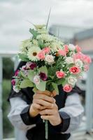 female hands holding flowers, love, friendship. 19 april 2019 jember - indonesia photo