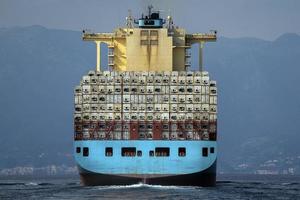 Container ship near the coast photo