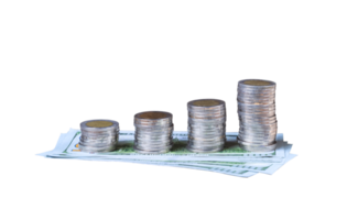 Columns of coins stack on dollar banknotes on isolated white background with clipping path png