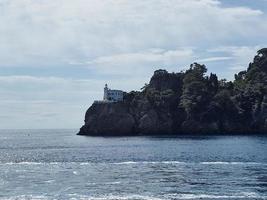 Portofino cliffs from the sea photo