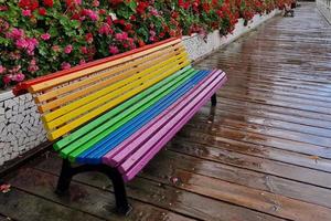 Rainbow flag bench after the rain in Valencia photo