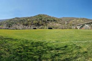 country soccer field with flowers photo