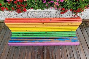 Rainbow flag bench after the rain in Valencia photo