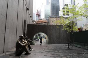 NEW YORK, USA - MAY 5 2019 -  Dog and bunny photographer statue photo