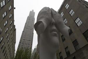 NEW YORK, USA - MAY 5 2019 - Sculpture at Rockefeller Center Behind the wall photo