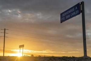 Puerto San Carlos Baja California Sur Mexico city sign at sunrise photo
