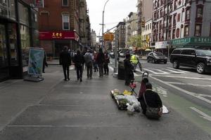 NEW YORK, USA - MAY 4 2019 - Chinatown streets markets and shops photo