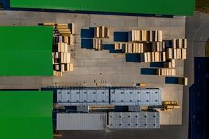 Woodworking plant top view of a pallet with products for shipment, top view from a drone. photo