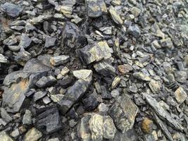 dirty coal gravel texture with soil photo