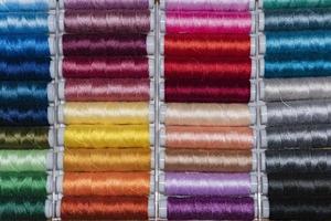 many colors sewing Thread spools photo