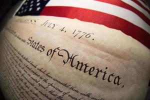 Declaration of independence 4th july 1776 on usa flag photo