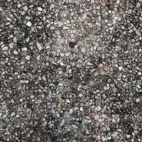 The pattern small black and grey pebbles stone as background. pebbles texture wall and floor. photo