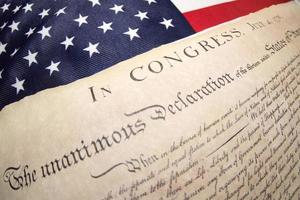 Declaration of independence 4th july 1776 on usa flag photo