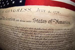 Declaration of independence 4th july 1776 on usa flag photo