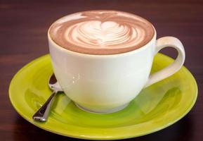 cup of coffee on table photo