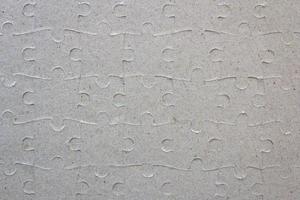 Gray paper jigsaw puzzle photo