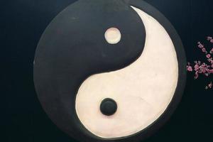 Yin Yang symbol pendant isolated photo