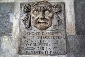 VENICE, ITALY - SEPTEMBER 13 2019 - Mouth Box for Secret denunciations against those who hide favors and offices or collude to hide the true income of them in Venice ancient whistleblowing system photo