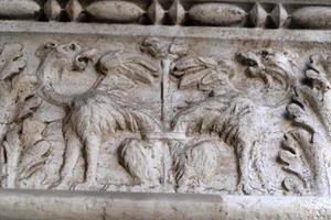 VENICE, ITALY - SEPTEMBER 15 2019 - doge ducal palace capital of column wayside sculpture detail photo