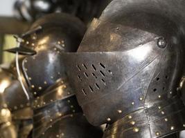 many medieval iron metal helm armor