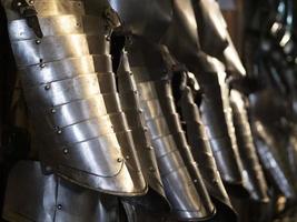 many medieval iron metal armor photo