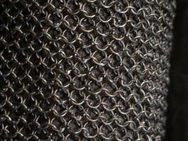 many medieval iron chain metal armor photo