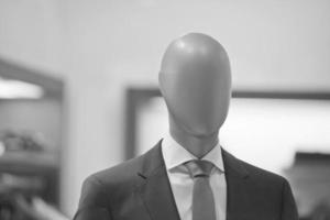 man dressed mannequin in black and white photo