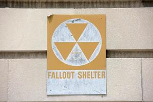 fallout shelter sign on a building photo