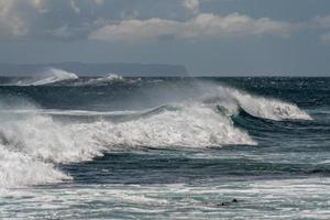 pacific ocean waves on the shore photo