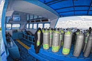 Tank on scuba diving boat photo