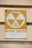 fallout shelter sign on a building photo
