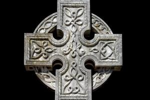 celtic cross cemetery on black photo